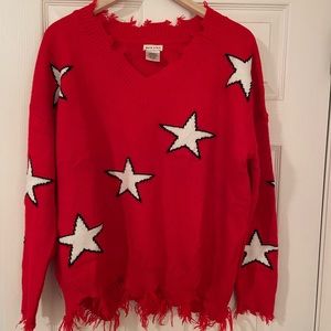 Red sweater with white stars